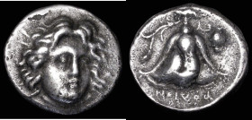 Ancient Greece, Rhodes - Caria, Didrachm (c.250BC) Obverse: Facing radiate head of Helios, Reverse: Rose with bud to right, EY and jug in left field, ...