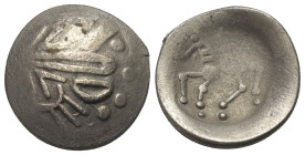 Ostkelten. Muntenien. Typ 'Sattelkopf'.

 Tetradrachme (Silber).
Vs: Stark stilisierter Kopf des Zeus mit Lorbeerkranz rechts.
Rs: Stark stilisier...