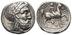 Ostkelten. Philippos II - Typen.

 Tetradrachme (Silber).
Vs: Kopf des bärtigen Zeus mit Lorbeerkranz rechts.
Rs: Nackter Jüngling mit Palmzweig z...