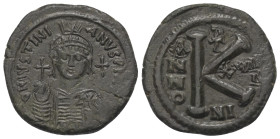 Iustinianus I. (527 - 565 n. Chr.).

 Halbfollis (20 Nummi). 543/ 544 n. Chr. Nikomedia.
Vs: Büste mit Helm, Diadem, Panzer, Kreuzglobus und Schild...