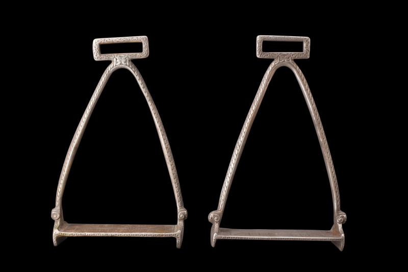 RARE PAIR OF SILVER VIKING STIRRUPS WITH INTERLACED BAND

 Ca. 9th century AD...