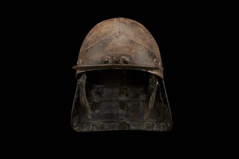 GERMAN LOBSTERTAIL HELMET

 Ca. 17th century AD
 Round skull with horizontal ...