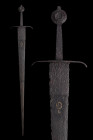 LATE CRUSADERS IRON SWORD - FULL REPORT

 Ca. 1350-1450 AD
 An excellent forged-iron long sword with broad blade tapering to a sharp point. About a...
