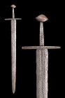 NORMAN SWORD WITH BRAZIL NUT POMMEL

 Ca. 1100 AD
 A hand-forged iron sword comprising of a narrow two-edged blade with shallow fuller to both face...
