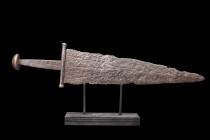 MEDIEVAL IRON DAGGER

 Ca. 900-1100 AD
 An iron military dagger comprising a short triangular blade with thick midrib and tapering edges, narrow po...