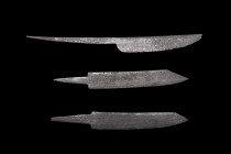 MEDIEVAL VIKING IRON SINGLE-EDGED KNIFE BLADE GROUP

 Ca. 900-1300 AD
 A group of iron knife blades comprising of a slender cutting edge and a long...