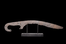 IBERIAN FALCATA SWORD

 Ca. 300-200 BC
 A single-edged machaira sword of falcata typology, with a curved hilt of regular geometric shape; grooves o...
