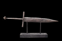 MEDIEVAL IRON DAGGER WITH BRAZIL-NUT POMMEL

 Ca. 1200-1300 AD
 An interesting iron dagger of a quite lethal form. Blade sharpened on each edge, Cr...