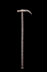 MEDIEVAL IRON WAR HAMMER

 Ca. 1300 AD
 A war hammer forged from iron with a slender body, a tapered handle meant to accommodate a leather wrap, an...