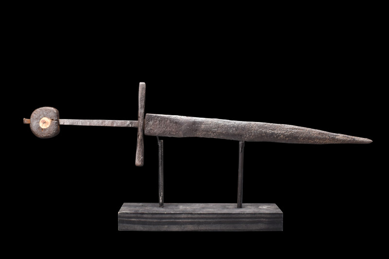 MEDIEVAL IRON DAGGER WITH DISC-SHAPED POMMEL

 Ca. 1300-1500 AD
 An iron doub...