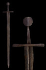 MEDIEVAL SWORD WITH ROUND POMMEL

 Ca. 1425-1550 AD
 An iron sword Oakshott type ‘G1’ of a double-edged bevelled and pointed blade with shallow gro...
