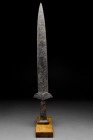 SCYTHIAN IRON ACINACES SWORD

 Ca. 500-400 BC
 An iron acinaces-type sword with long, broad tapering blade, which terminates in a point, rectangula...