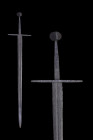 MEDIEVAL IRON SWORD

 Ca. 1250-1520 AD
 This fine Medieval sword features a pommel of an unusual design. It is circular when viewed from the front ...