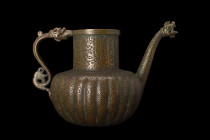 TIMURID BRONZE TEAPOT

 Ca. 14th century AD
 A bronze teapot with a bulbous lower body, nicely decorated with vertical ribs that add texture and vi...