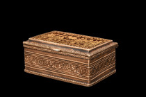 INDIAN TRINKET BOX

 India, ca. 19th century AD
 A charming cuboid box adorned with intricate floral and beaded ornamentation around all four walls...