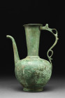 SELJUK BRONZE EWER

 Ca. 1200 AD
 A bronze ewer with a bulbous body and rounded collar of the vessel harmoniously complement the tall funnel-shaped...