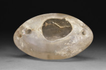SASANIAN ROCK CRYSTAL BOWL / CANDLE STAND

 Ca. 8th-9th century AD
 A simple, yet elegant flat-bottomed rock crystal carved bowl of ovoid form with...