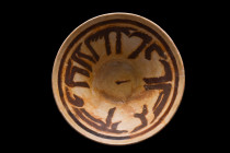 SAMANID POTTERY BOWL WITH CALLIGRAPHY

 Ca. 900-1000 AD
 A conical-shaped pottery bowl created by skilled artisans, this piece boasts a white slip ...