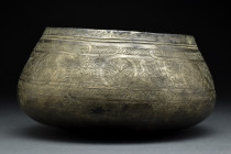 MAMLUK BOWL

 Ca. early 15th century AD
 A highly ornamented bowl featuring a squat body sitting on a roundish base and tapering to the mouth. Inci...