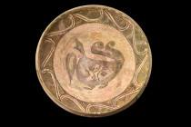 ABBASID POTTERY BOWL WITH A BIRD

 Ca. 900-1000 AD
 A glazed pottery bowl of conical shape, gently curving walls, and ring foot create a harmonious...