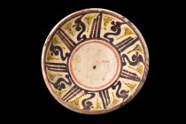 SAMANID POTTERY BOWL WITH CALLIGRAPHY

 Ca. 900-1000 AD
 A slip-painted pottery bowl, with its conical form and short foot. The inward curving lip ...