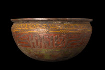 ISLAMIC BRONZE BOWL WITH CALLIGRAPHY

 Ca. 17th-19th century AD
 A bronze bowl with deep basin boasting a broad profile with a slightly rounded bas...