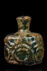 APPLE BOTTOMED GLASS FLASK

 Persia, Ca. 9th-11th century AD
 A glass bottle with an apple-shaped body sitting upon a flattened base. From the top ...