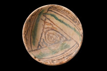 NISHAPUR POTTERY BOWL

 Ca. 9th-10th century AD
 A pottery bowl, showcasing the exceptional artistry and beauty of Islamic ceramic production in Ni...