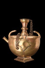 INDIAN BRASS PILGRIM FLASK

 Deccan, ca. 16th-18th century AD
 A brass pilgrim flask, an exquisite work of art characterized by its crescent-shaped...
