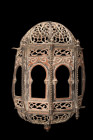 ISLAMIC OPENWORK WALL LANTERN

 Ca. 17th-19th century AD
 An openwork wall lantern formed in the round with a domed top and a rounded bottom adorne...
