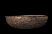 ISLAMIC BRONZE MAGIC BOWL

 Ca. 17th-19th century AD
 A nice example of a magic bowl, a work of art that has been carefully crafted to protect its ...