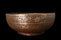 ISLAMIC TINNED COPPER DECORATED BOWL

 Ca. 17th-19th century AD
 A tinned copper basin with a hemispherical bowl sitting upon a graceful ring foot ...