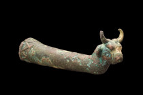 ANCIENT BRONZE BULL RHYTON

 Luristan Culture, ca. 1000 BC
 A bronze rhyton with a conical body is adorned with a striking zig-zag pattern around t...