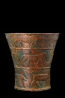 URARTIAN BRONZE VESSEL WITH ANIMALS 

 Ca. 700 BC
 A bronze beaker, expanding from a flat, circular base to a funnel-shaped cup, adorned with three...
