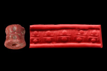 MESOPOTAMIAN STONE CYLINDER SEAL - ORIGINAL LAMBERT REPORT

 Ca. 3000 BC
 Cylinder seal of red stone. Frieze of four spiders. Good condition. Accom...