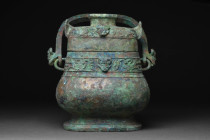 CHINESE WESTERN ZHOU BRONZE RITUAL VESSEL - YOU - XRF TESTED

 Ca. 1045 - 771 BC
 Western Zhou Dynasty. A beautiful bronze ritual wine vessel with ...