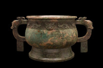 CHINESE BRONZE RITUAL FOOD VESSEL (GUI)

 Early Western Zhou Dynasty, Ca. 11th - 10th century BC
 The body of the vessel is bulbous in shape, conta...