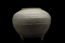 CHINESE HAN DYNASTY GREY POTTERY JAR - TL TESTED

 Ca. 202 BC - 220 AD
 A globular shaped vessel formed of a rich grey terracotta with three bands ...