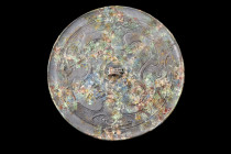 CHINESE TANG DYNASTY BRONZE MIRROR

 Ca. 618-907 AD or later
 A bronze mirror of discoid form, graced with a central knob and masterfully decorated...