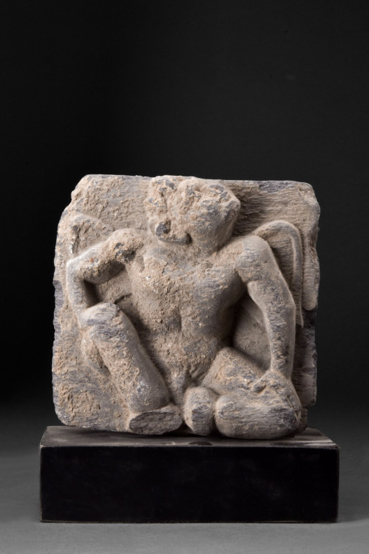 GANDHRAN SCHIST PANEL WITH WINGED ATLAS

 Ca. 200-300 AD
 A schist panel feat...