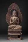 CHINESE WOOD BUDDHA WITH AUREOLE

Middle periods, ca. 19th century AD
Carved wood Buddha seated on a multi-tiered fancy integral base. Depicted wit...