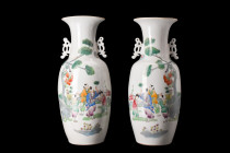 CHINESE PAIR OF LARGE PORCELAIN VASES

 
 A pair of porcelain vases, each featuring a bulbous, elongated body that tapers gently to form a funnel-s...