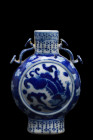 CHINESE QING DYNASTY PORCELAIN MOONFLASK

 Ca. 1644-1912 AD
 A captivating blue and white "pilgrim flask," a rare and fascinating example of Chines...