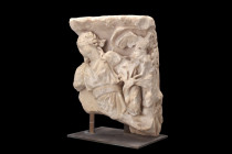 ROMAN MARBLE PANEL WITH A GODDESS 

 Ca. 100-300 AD
 A marble fragment from a sarcophagus depicting a bust of a goddess figure, robed in fine garme...