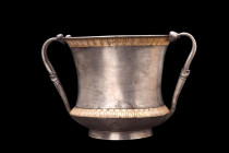 ROMAN SILVER SKYPHOS

 Ca. 100 AD
 A breathtaking Roman silver skyphos, that exudes an air of regality and luxury. It features a beautifully shaped...
