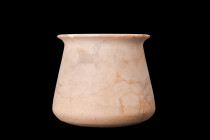EGYPTIAN ALABASTER VESSEL

 New Kingdom, ca. 1550-1070 BC
 An alabaster vessel, an exquisite work of art skillfully crafted from a rare and prized ...