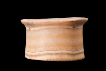 EGYPTIAN ALABASTER VESSEL

 New Kingdom, ca. 1550-1070 BC
 A nice vessel crafted from alabaster, a stone cherished by the ancient Egyptians for its...