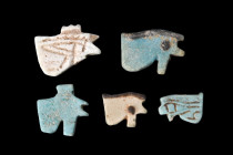 EGYPTIAN GROUP OF WEDJAT-EYE AMULETS

 Ca. 664-30 BC
 A selection of five uzat amulets, also referred to as eye of Horus or Wedjat-eye amulets, wit...