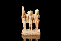RARE EGYPTIAN FAIENCE AMULET WITH OSIRIAN TRIAD (ISIS, HORUS, AND NEPHTYS)

 Late Period, ca. 700-30 BC
 A glazed composition amulet featuring a re...