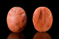 EGYPTIAN CARNELIAN SCARAB

 Ca. 664-332 BC
 An Egyptian carnelian scarab with incised detailing to form a ridged carapace and naturalistic features...
